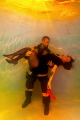   Fire fighter rescuing woman flames. This photo was taken pool wasnt 100 clear time get bit diffuse atmosphere like smoke. flames smoke  
